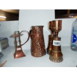 4 pieces of arts and crafts copper including candlesticks