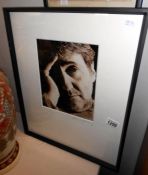 A framed and glazed photograph of Tom Conti