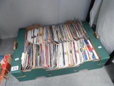 A large box of 45 rpm records