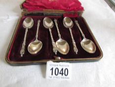 A cased set of 6 silver apostle spoons, hall marked Sheffield 1902, J L & S,