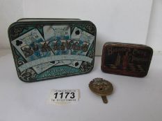 2 vintage tins and a York and Lancaster badge