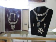 A cased diamonte necklace with earrings and other diamonte jewellery