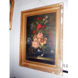 A gilt framed oil on canvas floral arrangement,