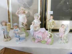 A small collection of 19th century bisque figurines