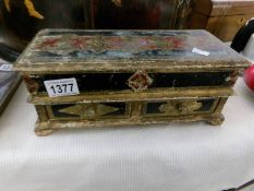 A painted jewellery box with 2 drawers