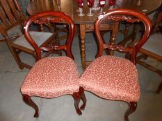 A pair of cabriole leg dining chairs
