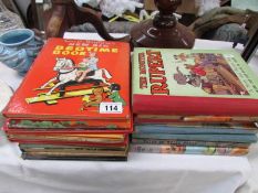 A mixed lot of children's annuals including Sooty and Rupert Bear