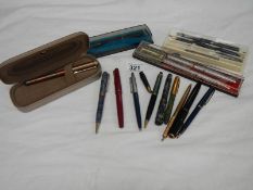 A quantity of pens and fountain pens