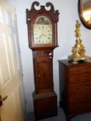 An inlaid Grandfather clock with Lincoln painted face