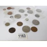 A mixed lot of coins including some silver