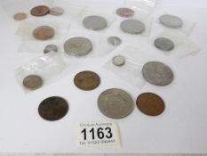A mixed lot of coins including some silver