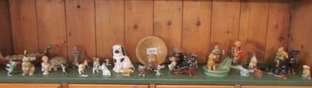 A mixed lot of animal and other figures including Wade