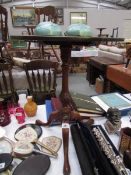 An oak tripod occasional table