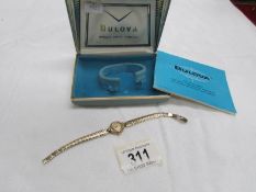 A 10ct rolled gold Bulova ladies wrist watch in box,