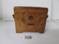 A wooden concertina musical jewellery box (clasp in drawer)