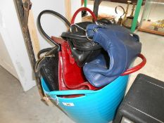 A tub of leather hand bags including Valentina, Tula, Russell and Bromley,