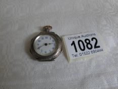 A ladies silver fob watch with enamel dial,