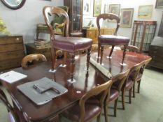 A set of 12 mahogany dining chairs
