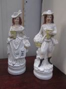 A pair of continental porcelain figures