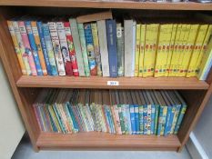2 shelves of children's books including Rupert, Enid Blyton,