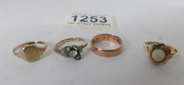 4 9ct gold rings including 2 set with stones