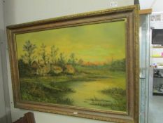 An oil on board country scene signed G Cole