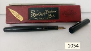 A boxed Swan fountain pen