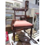 A mahogany bar back chair