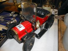 A large vintage style tin plate car