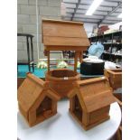 A new wooden wishing well planter and 2 bird houses