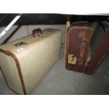 A vintage trunk and suitcase