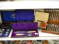 A collection of cased cutlery sets including carving,