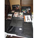 7 case logic DVD cases full of original DVD's including action,