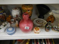 A shelf of miscellaneous china