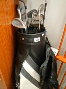 A golf bag and clubs