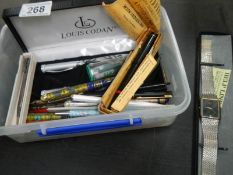 A box of pens etc