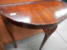A D shaped occasional table