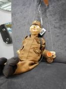A string puppet of a soldier