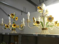 A pair of 6 lamp ceiling lights with floral decoration