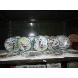 14 oriental style collector's plates