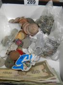 A quantity of UK and foreign coins and bank notes