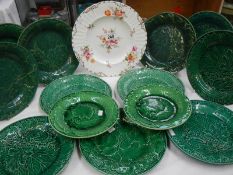 13 green leaf/cabbage plates and one other