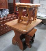 A rustic table and 4 stools