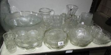 A shelf of glass ware