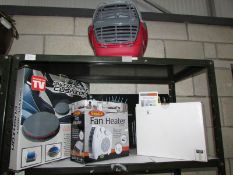 A pet carrier, fan heater,