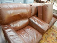 A brown leather sofa,