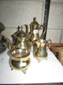 A brass 4 piece tea set