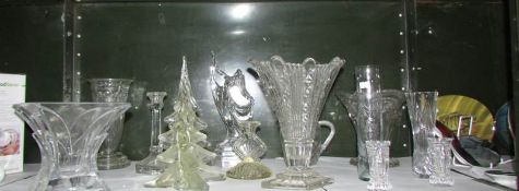 A shelf of glass ware