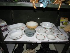 A shelf of pyrex