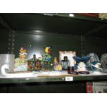 A shelf of miscellaneous ornaments etc